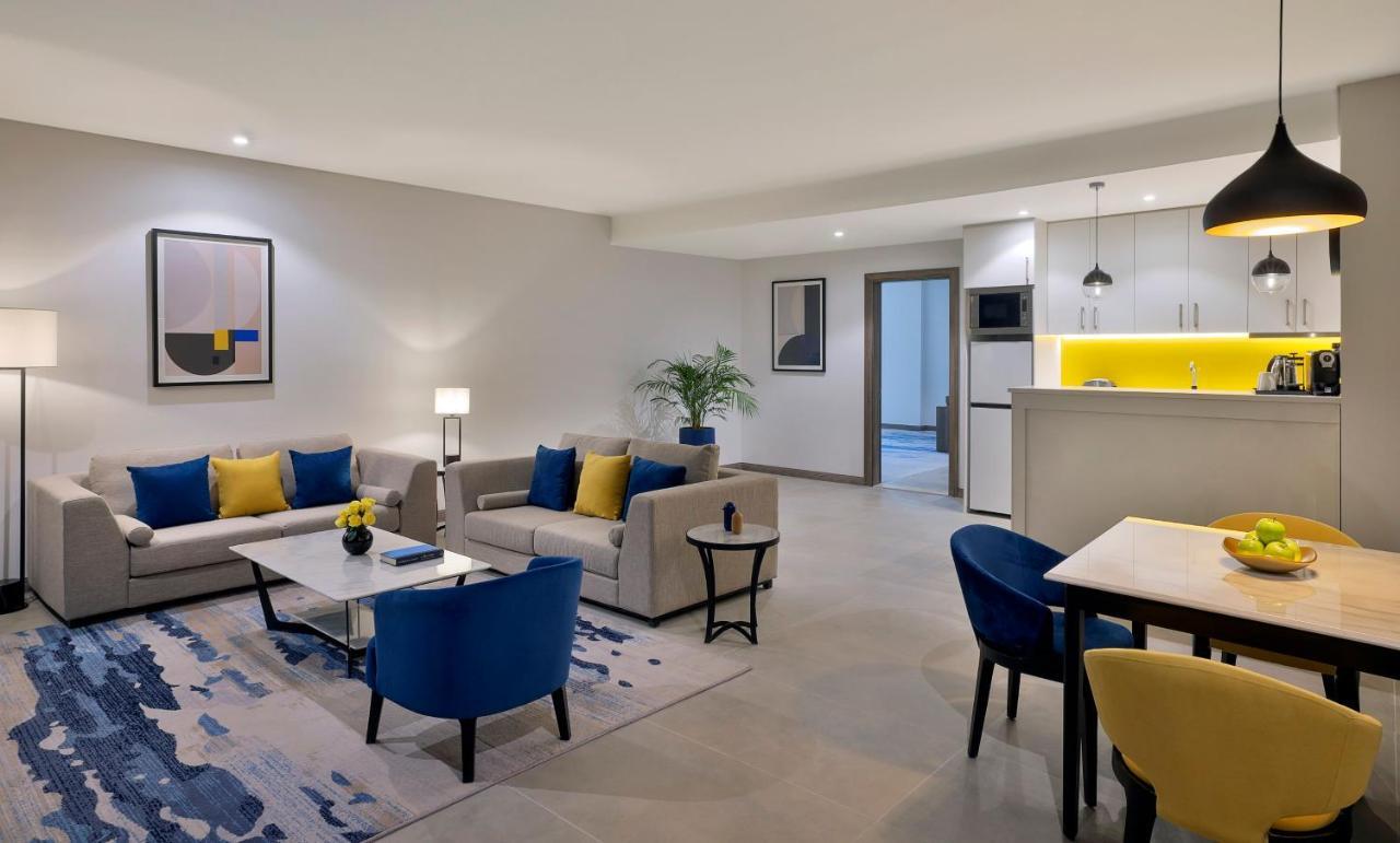 阿尔科巴尔Voco酒店 阿可贺巴 外观 照片 A living room at the hotel