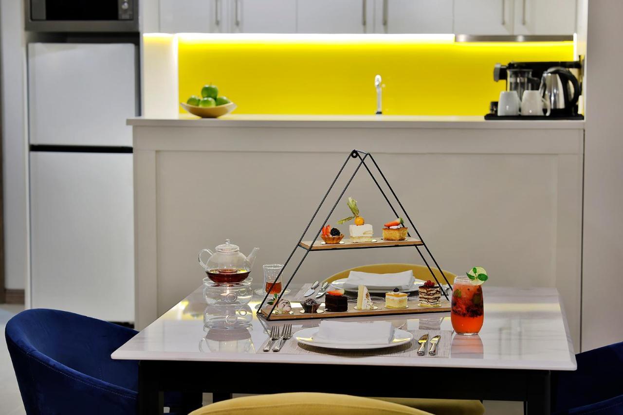 阿尔科巴尔Voco酒店 阿可贺巴 外观 照片 A pyramid cake stand
