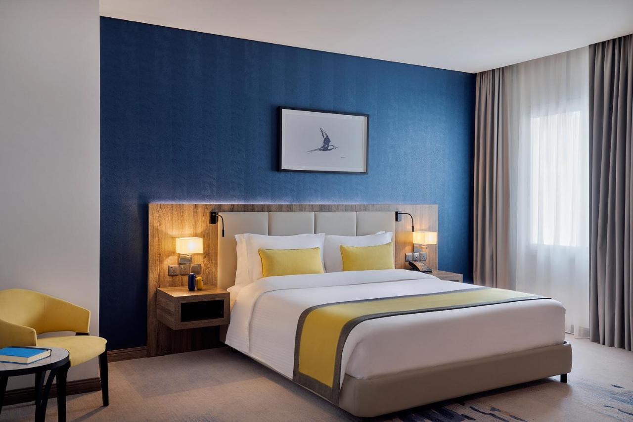 阿尔科巴尔Voco酒店 阿可贺巴 外观 照片 A bedroom at the hotel