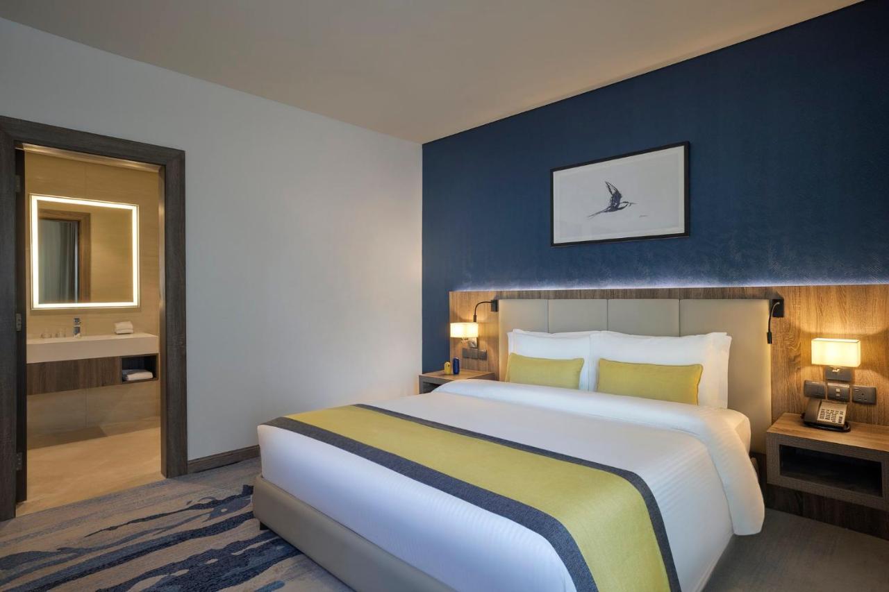 阿尔科巴尔Voco酒店 阿可贺巴 外观 照片 A bedroom at the hotel