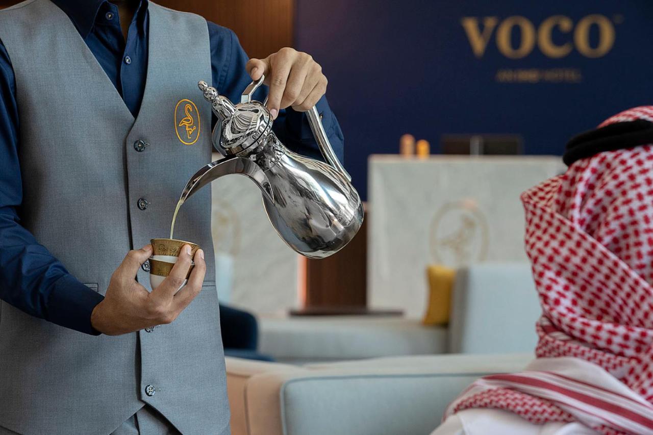 阿尔科巴尔Voco酒店 阿可贺巴 外观 照片 Arabic coffee being served